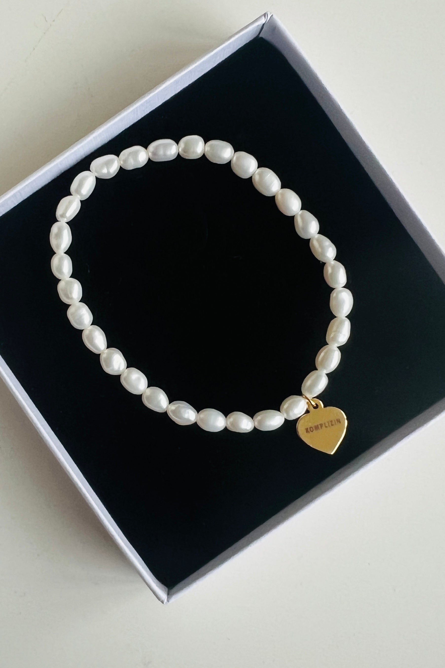 Perlenarmband KOMPLIZIN