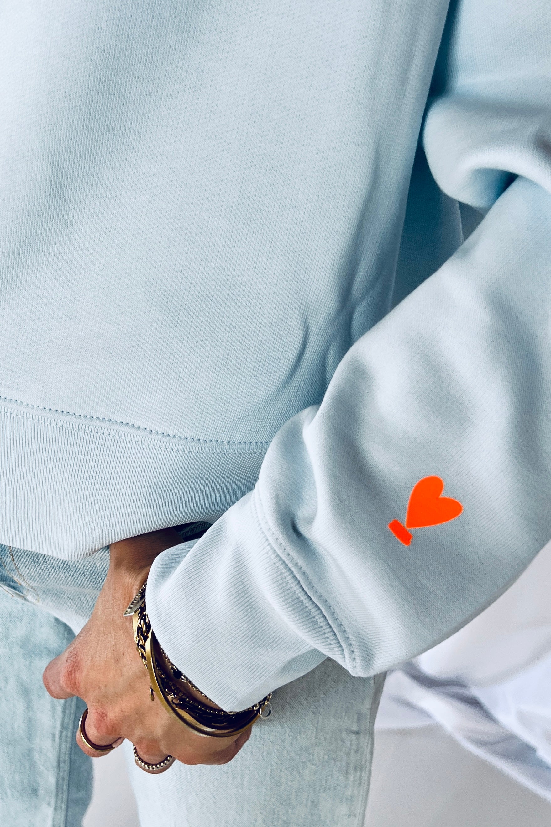 Sweater crop UNE REBELLE sky blue/ neon orange